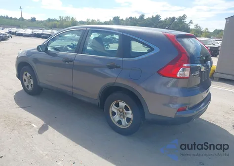 2015 Honda Cr-V Lx z USA, uszkodzony, nr VIN 2HKRM4H37FH617537